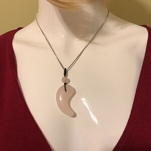 Polar Jade silvertone angel wing necklace. NWT